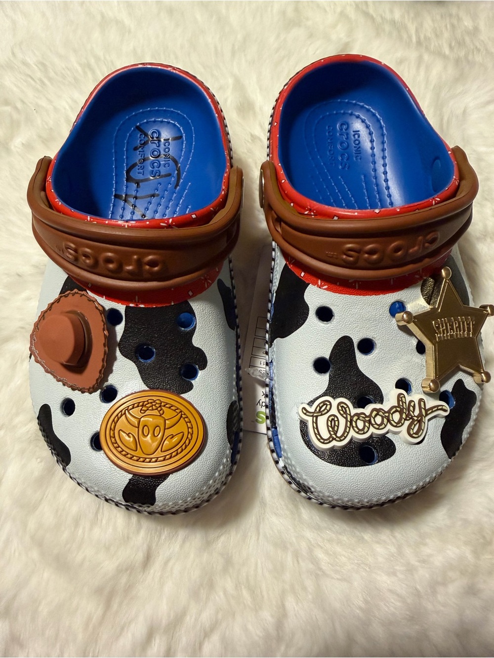 CROCS Kids Woody Cow-Print Clogs in White, Black, Blue & Brown